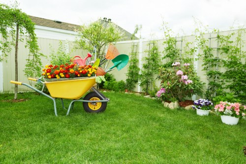Local gardener maintaining a vibrant garden in Jindalee