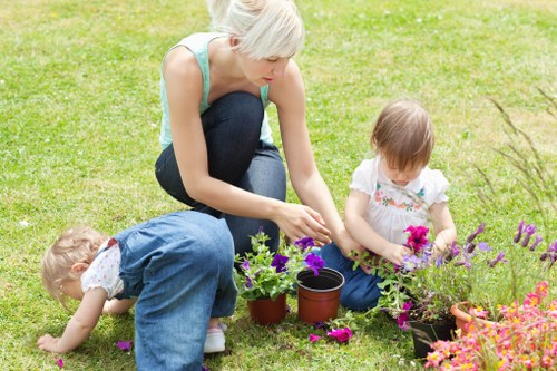 Professional gardener maintaining a lawn