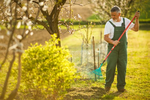 Grace Gardeners team performing garden clearance